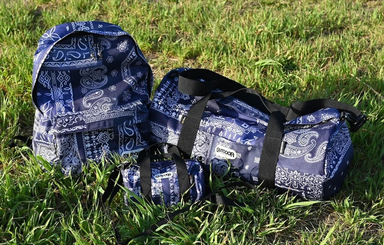 【アウトドアプロダクツ】バンダナ柄を纏ったトリプルコラボコレクションが登場