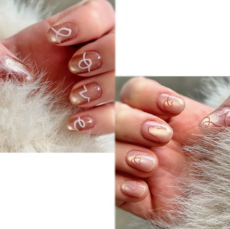 甘さ控えめで楽しむ大人世代のバレンタインネイルデザイン ブラウンとピンクのマグネットネイルにLOVEの繋げ文字とハートアートを取り入れたデザイン 冬ネイル