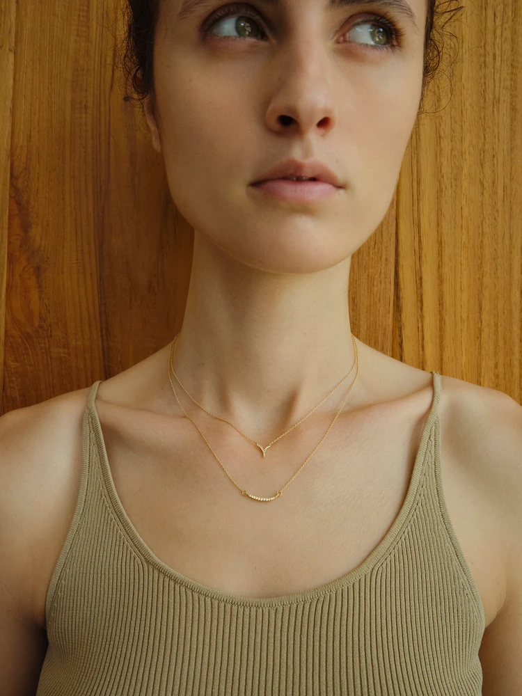〈Leaf〉ネックレス 上 ￥242,000 / ネックレス 下 ￥264,000