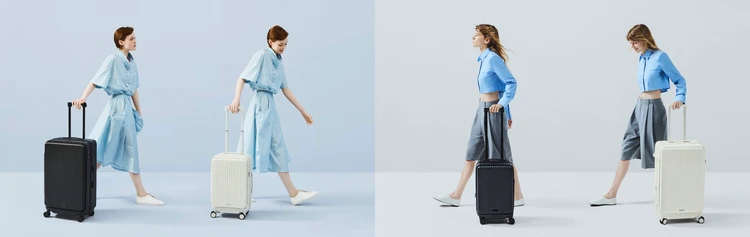 レスポートサック（LeSportsac）のスーツケースを引くモデル