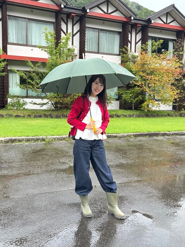 長靴と傘を着用した写真