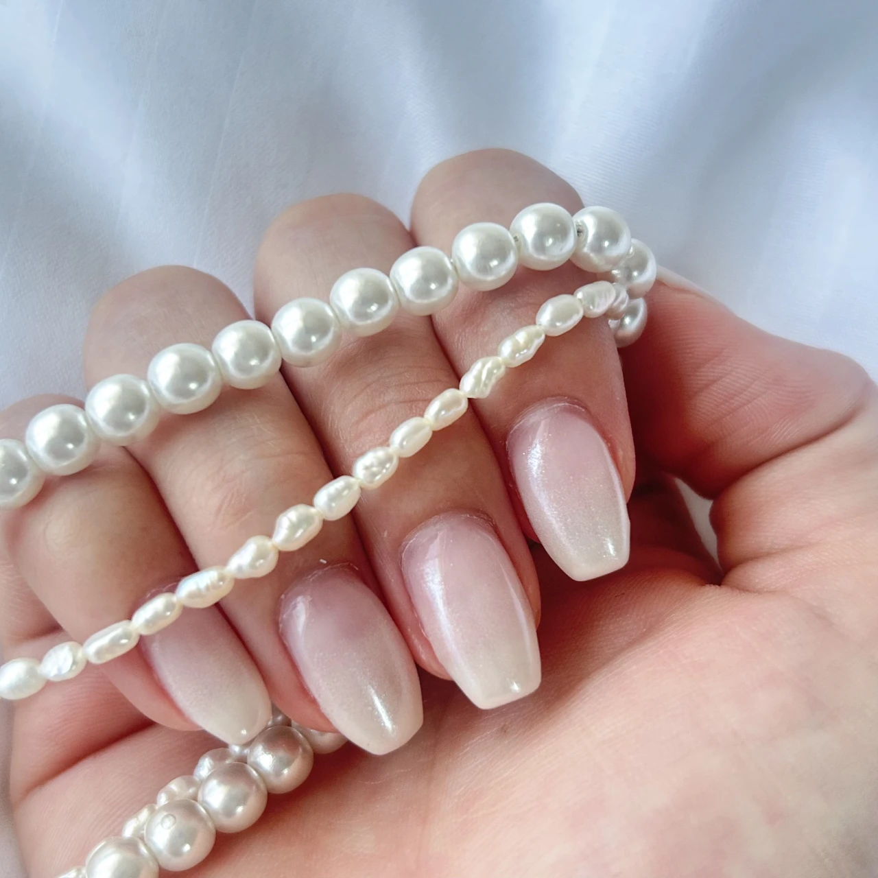 夏のパールネイル|透け感×艶感が涼しげ!オフィスネイルにも♡