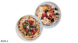 とろとろのチーズとオリーブオイルがバランスよく混じり合った薄めのピザはお酒のアテにも最適。