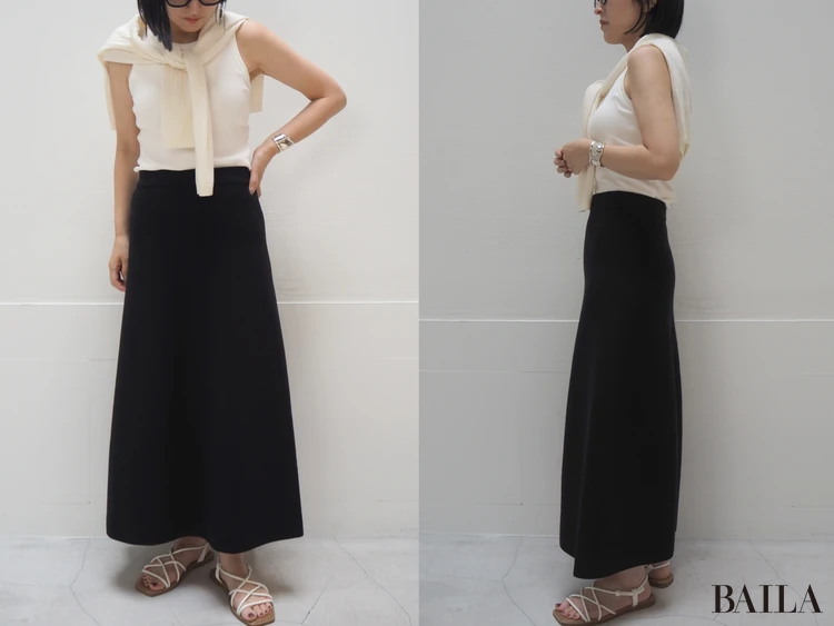 タイトなトップスと同色の羽織を合わせて女っぽく