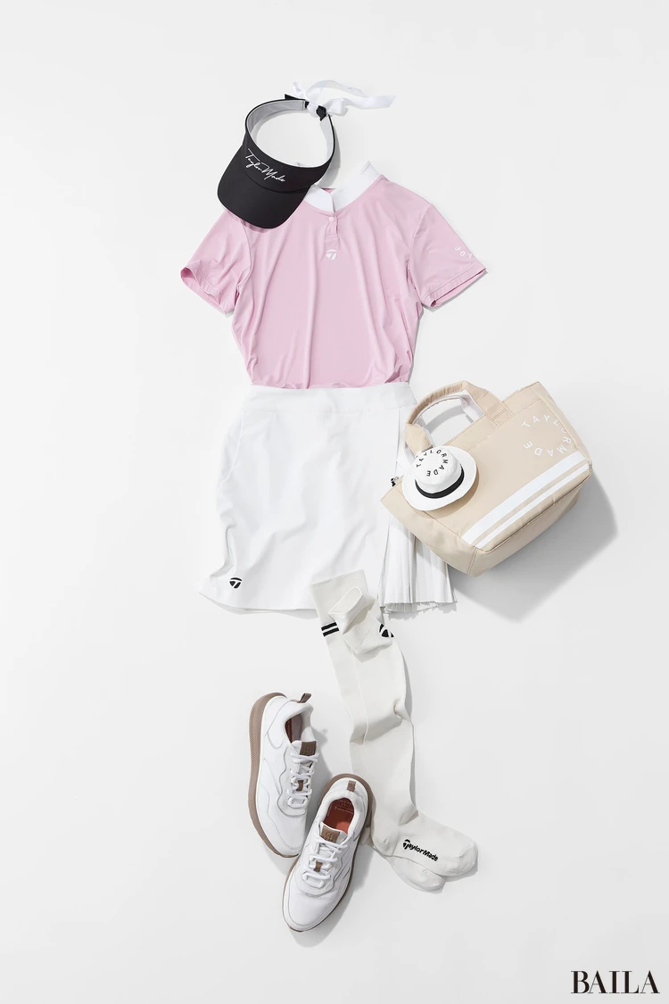 テーラーメイド　ベビーピンクトップスのゴルフウエア