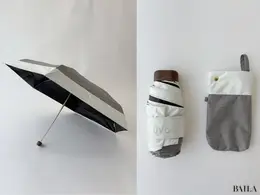 UVO（ウーボ）の「５段折りたたみ傘 無地 切り継ぎ」