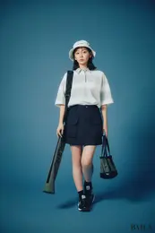 ニューエラゴルフ　ゴルフウエアを着た鈴木愛理