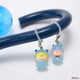 ミルモでポン！ めじるしアクセサリーのミルモ、ムルモをかさの持ち手につけた写真