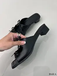 リボンヒールミュール　黒　サイド　ジーユー