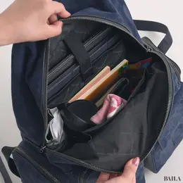 マイケルコース　リュック　収納力　通勤グッズをバッグに入れた様子