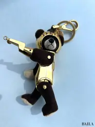 プラダ バッグチャーム クマ ゴールド 横