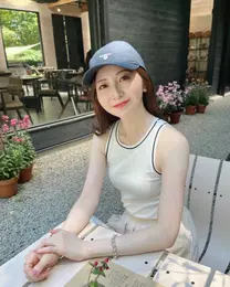 バブアー　キャップ　公園コーデ　きれいめカジュアル